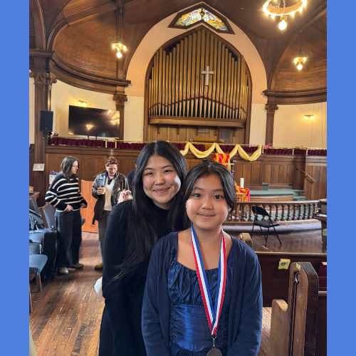 Girl with medal inside church