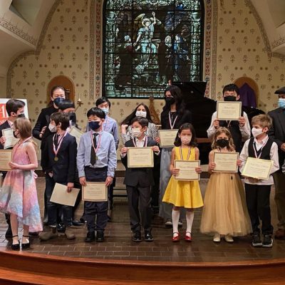 Students with recital award certificates