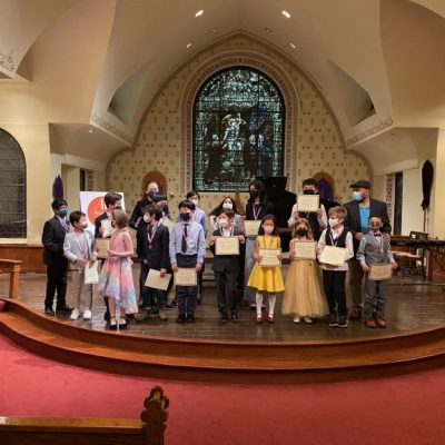 Students with recital award certificates
